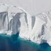 Climate Change Intensifies Global Thermal Divide and Accelerates Antarctic Ice Melt