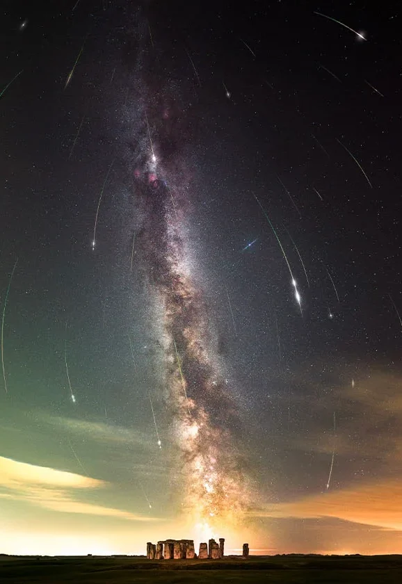 Astrophotographer Captures Perseid Meteor Shower Over Stonehenge, Highlighting the Importance of Dark Skies