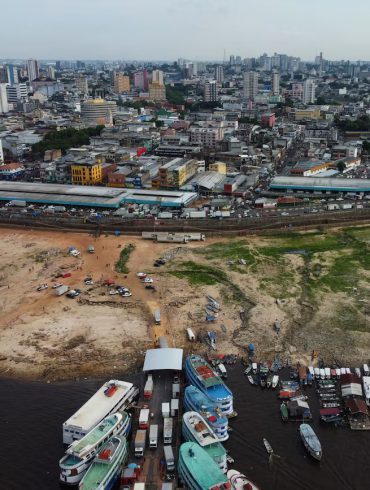 Negro River Hits 122-Year Low, Exposing Drought's Devastating Impact on Amazon and Local Communities