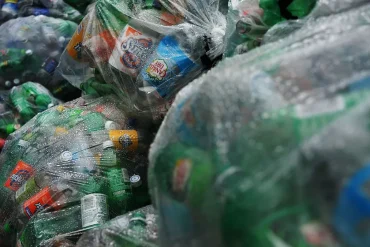 Michigan Debates Bottle Bill Expansion to Include Water Bottles Amid Environmental and Economic Concerns